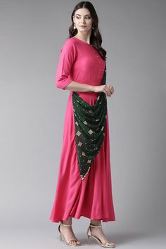 This ahalyaa poly rayon a line kurta in dark pink is ideal to wear on a light festive occasion. The kurta has an attached green dupatta. There is no lining in the kurta. Note: height of the model is 5'8" and she is wearing a size 's' from the ahalyaa size chart. Please choose a garment size at least 2" more than your body measurement for ease of wearing and taking off the garment. Product Features:   Color: Dark Pink Fabric: Rayon Pattern: Printed Fit: Regular Sleeve: Three-Quarter Sleeves Neck Navratri Pink Kurta With Traditional Drape, Diwali Maxi Kurta With Sheer Dupatta, Diwali Maxi Length Kurta With Sheer Dupatta, Long Kurta With Sheer Dupatta For Navratri, Pink Kurta With Self Design In Traditional Drape, Pink Kurta With Traditional Drape And Self Design, Pink Self-design Kurta With Traditional Drape, Pink Kurta With Dupatta For Celebration, Pink Maxi Length Kurta With Sheer Dupatta