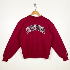 Vintage NCAA Stanford University Cardinal Crewneck Sweatshirt Print Logo Red Color Men's S - Made in Honduras  - Materials : Cotton, Polyester  - Tag Reads : S Kindly see the actual measurements (All measurements were taken lying flat) - Actual size manual measurements * Width (Armpit to armpit) : 20 inches * Length (Shoulder to end of garment) : 24 inches * Sleeve length : 24 inches - Condition : * Good condition 9/10 (90%) * Free from any tear and major defect - Shipping : * DHL EXPRESS = 3-6 business day arrived * Please PROVIDE your PHONE/CONTACT NUMBER for SHIPPING/DELIVERY purpose DON'T FORGET TO VISIT MY SHOP FOR MORE GREAT STUFF, THANK YOU. Red Collegiate Cotton Sweater, Red College Sweater With Ribbed Cuffs, Red Crew Sweatshirt With Letter Print, University Red Cotton Sweatshirt With Letter Print, Sporty University Red Crew Neck Sweatshirt, Classic Red Crew Neck Sweatshirt, Red Varsity Top With Ribbed Cuffs, Classic Red Cotton Sweatshirt, Red Crew Neck Tops For Winter