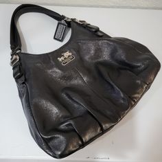 Coach Madison Pearlized Black Leather Maggie Hobo Shoulder Bag Purse Tote In Great Condition With Some Wear Around One Of The Interior Pockets. Seen In Photos. Elegant Hobo Satchel With Gunmetal Hardware, Formal Black Hobo Bag With Silver-tone Hardware, Black Hobo Bag With Branded Hardware And Top Handle, Classic Black Hobo Bag With Silver-tone Hardware, Designer Black Hobo Bag For The Office, Elegant Formal Hobo Bag With Gunmetal Hardware, Black Hobo Bag With Double Handle And Branded Hardware, Black Hobo Bag With Branded Hardware For Travel, Classic Black Hobo Bag With Gunmetal Hardware