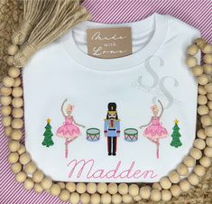 Your little one will be crushing it this Christmas in this adorable shirt! When ordering an embroidered item, please specify your desired monogram initials or name, monogram font & thread color. All of the monogram options can be found here. Also, please note any other special requests in the box provided. We will try our best to comply. Christmas Monogram Ideas, Ballet Shirts, Crushing It, Nutcracker Ballet, Christmas Monogram, Monogram Fonts, Holiday Shirts, Monogram Initials, Christmas Design