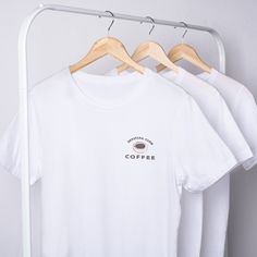 Meet the Organic Cotton Crew Neck 'Coffee club' T-shirt - a must-have for every coffee lover's wardrobe!  ▸ Mid-weight, 5.3 oz/yd²  ▸ Made from 100% combed organic cotton  ▸ Free from herbicides and pesticides, GOTS certified  With durable neck ribbing, twin needle stitching, side seams, double-needle hems, and shoulder-to-shoulder tape, this preshrunk tee keeps its shape wash after wash. Elevate your style sustainably with this premium, cozy t-shirt! Coffee Color Crew Neck T-shirt For Everyday, Pre-shrunk Cotton Coffee Tops, Pre-shrunk Cotton Coffee Colored Tops, Coffee Color Crew Neck Top For Everyday, Coffee Color Crew Neck T-shirt With Screen Print, Coffee Colored Crew Neck T-shirt For Everyday, Coffee Cotton T-shirt With Screen Print, Coffee Cotton Graphic Tee, Coffee Colored Cotton Graphic Tee