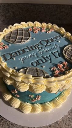 a cake that is sitting on top of a plate with the words damage city written on it