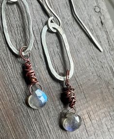 Handmade Artisan Boho Silver, Oxidised Copper and Labradorite Dangle Earrings with Handmade Recycled Oxidised Silver Ear Wires. Lovely light earrings with a beautiful mix of contrasting colours and materials.  A lovely swing too to these boho earrings! Made in England. Total length 5.5 cm Drop length 4 cm Free shipping when you spend over £40!  Promo will be applied at checkout if you spend over this amount. Please see my other handmade jewellery. Bohemian Silver Wire Wrapped Earrings, Bohemian Sterling Silver Wire Wrapped Earrings, Handmade Bohemian Silver Clip-on Earrings, Bohemian Rust-colored Nickel-free Earrings, Bohemian Silver Wire-wrapped Crystal Earrings, Oxidised Copper, Contrasting Colours, Light Earrings, Labradorite Earrings