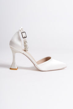 BRIDAL SHOES, SATIN WEDDING HEELS, BRIDE HEELS, WHITE STILETTO HEELS

As Eleanor Louise, we stand out with our White heeled shoes that combine style and comfort. Specifically designed for brides, these shoes are crafted with high-quality materials.
• Completing your style and boosting your confidence is the most elegant way! 3.15-inch (8 cm) high-heeled shoes offer elegance and chicness with every step. Elegant Low Heel Bridal Heels, Elegant Low Heel Bride Heels, Elegant Ankle Strap Wedding Shoes For Bride, Elegant High Heel Bridal Shoes, Elegant High Heel Bridal Heels, Elegant High Heels For Bride, Elegant White Heels For Wedding Reception, Wedding Court Shoes With Ankle Strap And 4-inch Heel, Elegant Bridal Heels With Ankle Strap