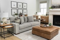 a living room filled with furniture and a fire place