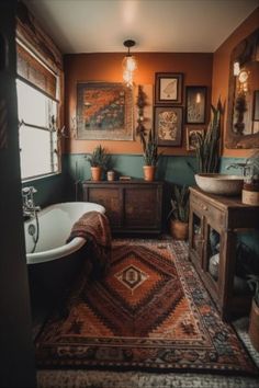 a bathroom with a rug, sink and bathtub in front of a window on the wall