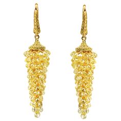 JR 28.65 carats Yellow Diamond Briolette Grapes Earring Made using a very special technique, this yellow briolette grape earring looks like a piece of contemporary art. The unique yellow color of the briolettes makes this piece even more special. Diamond Weight : 28.65 carats Length approx : 5.5cm Width approx : 1.2cm Addition details or Video upon request. Customized order can be done according to requirement, Contact us on this platform to get more details. Gold Diamond Drop Earrings, White Tassel Earrings, Grape Earrings, Ring Wrap, Diamond Chandelier, Sabyasachi Jewellery, Ring Elegant, 18k Gold Earrings, White Gold Earrings