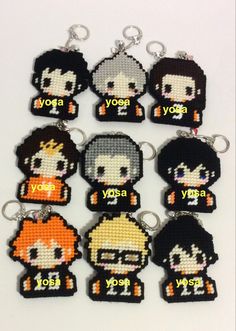 cross stitch keychains with different characters on them