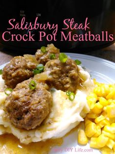 a white plate topped with meatballs and mashed potatoes next to a crock pot