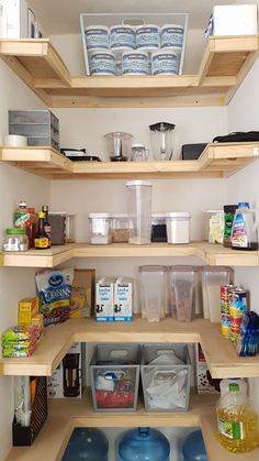 an organized pantry with lots of food and containers on the shelve shelfs