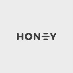 the word honey written in black on a white background