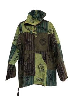 Introducing our one-of-a-kind Cotton Hoodie Shirt, handmade with love using 100% organic cotton. This festival shirt is not just stylish, but also eco-friendly. Each shirt features a beautiful patchwork design made from multicolored blockprint overdyed fabric, giving it a unique and vibrant look. The stonewash finish adds a subtle vintage touch. Available in sizes small to XXL, our shirt offers a comfortable and relaxed fit. The small size measures 21.5 inches pit to pit, 27 inches from shoulder Eco-friendly Green Cotton Top, Tie Dye Hooded Cotton Top, Hooded Tie Dye Cotton Top, Hooded Tie-dye Cotton Tops, Hooded Multicolor Cotton Tops, Multicolor Hooded Cotton Tops, Multicolor Cotton Hooded Tops, Hippie Style Patchwork Relaxed Fit Top, Hippie Patchwork Relaxed Fit Top