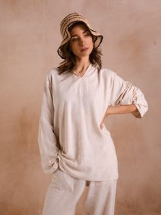 Our unisex loungewear sets are made from the finest imported Egyptian cotton and linen. Once the yarn arrives in Casablanca, it is transported to small villages around the town of Essaouira in southern Morocco. There, our in-house collaborative team of weavers, designers, and seamstresses produce our beautiful garments. Features: Loom woven Egyptian tissue Material content: 100% Linen Machine washable: delicate/cold water Relaxed Fit Long Sleeve Sleepwear For Leisure, Cream Linen Tops For Loungewear, Cream Linen Loungewear Tops, Long Sleeve Linen Sleepwear For Relaxation, Linen Long Sleeve Sleepwear For Lounging, Relaxed Fit Linen Tops For Relaxation, Relaxed Linen Top For Relaxation, Casual Linen Sleepwear For Relaxation, Casual Linen Sleepwear Relaxed Fit