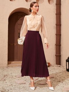 Luxury Traditional Black Skirt, Luxury Elegant Skirt For Holidays, Luxury Formal Skirt For Fall, Chic Luxury Pleated Skirt, Luxury Pleated Long Skirt, Chic Luxury Skirt For Day Out, Luxury Feminine Skirt For Fall, Evening Pleated Skirt, Black Fall Skirts