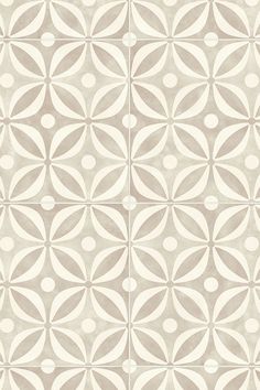 a beige and white tile pattern with circles