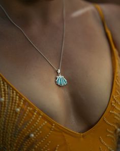 Wonderful seashell pendant will be an amazing addition to your look, You can wear it to the beach, party or to the meeting with your friends. It was made from silver and larimar and it is a very good quality pendant. Jewelry TypePendant Total Weight5.04 g Length26.50 mm Width19.72 mm Height4.76 mm Total Stone Weight3.3 ct Metal TypeSterling Silver Main StoneLarimar Main Stone Quantity4 Main Stone Weight3.3 ct Main Stone Length11.95 mm Main Stone Width3.50 mm Larimar Necklace, Seashell Pendants, Larimar Jewelry, Starfish Necklace, Ocean Jewelry, Blue Topaz Stone, Seashell Necklace, Silver Sandals, Bangle Designs