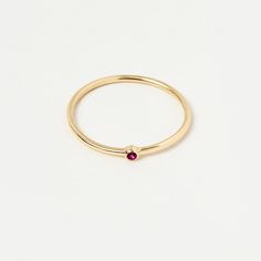 1- P R O D U C T ∙  D E S C R I P T I O N Indulge in the beauty of personalized elegance with this 14K Solid Gold Birthstone Ring. Adorned with a stunning gemstone of your choice, this ring is a beautiful piece that celebrates your birth month. Whether worn as a stacking ring or alone, this ring is sure to captivate attention with its elegance. 2- P R O D U C T ∙  D E T A I L S Gemstone options: As seen in the images Gold material: 14K solid gold Choice of gold color: Yellow gold, Rose gold, White gold Choice of ring size: - 5 US/CA - 5 1/4 US/CA - 5 1/2 US/CA - 5 3/4 US/CA - 6 US/CA - 6 1/4 US/CA - 6 1/2 US/CA - 6 3/4 US/CA - 7 US/CA - 7 1/4 US/CA - 7 1/2 US/CA - 7 3/4 US/CA - 8 US/CA - 8 1/4 US/CA - 8 1/2 US/CA - 8 3/4 US/CA - 9 US/CA Dimensions: * Band width: 1 mm / 0.04 in  3- S H I P Minimalist Gold Ruby Ring With Bezel Setting, 14k Gold Ruby Birthstone Ring, 14k Gold Round Ruby Birthstone Ring, 14k Gold Ruby Ring With Birthstone, Minimalist Yellow Gold Birthstone Ring With Round Stone, Luxury 14k Gold Ruby Birthstone Ring, Gold Minimalist 14k Gold Ruby Ring, Gold Minimalist 14k Ruby Ring, Minimalist 14k Gold Ruby Ring