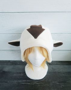 This Bison hat is made from fleece. ⫸ Perfect for: fans, cold weather, costumes, or conventions. Very warm! ⫸ Size: Fits anyone age 5+, one size fits most. Circumference about 24-25 in. ⫸ Care instructions: I recommend hand wash but should be fine in machine wash cold. All hats are made in a smoke-free, pet-free environment. All hats are made with a sewing machine. Patterns and designs are drawn, cut, and made by me. ▎Free shipping on orders over $35 (ground advantage shipping only) ▎ ⫸ Shipping White Themed Costume Hats And Headpieces, Themed White Costume Hats And Headpieces, White Halloween Cap, Halloween Cosplay Beanie Hat, Adjustable Beanie For Cosplay, Adjustable Beanie Hat For Cosplay, White Casual Felt Hat For Winter, Casual White Felt Hat For Winter, Adjustable Winter Hats For Costume Events