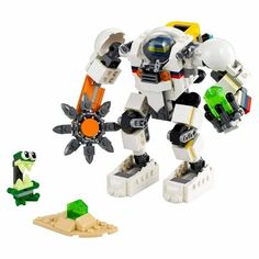 a lego robot is playing with a frog