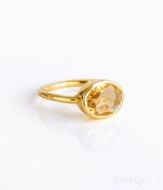 Youll fall in love with the stunning champagne color of this Citrine Quartz ring. This is a perfectly sized oval to compliment any collection. Popular as a birthday gift for those November babes and Citrine or Topaz lovers alike. This is a light, transparent yellow-orange gemstone with no flaws. Oval Citrine Birthstone Ring For Anniversary, Oval Yellow Gold Birthstone Anniversary Ring, Oval Yellow Birthstone Anniversary Ring, Yellow Oval Birthstone Anniversary Ring, Gold Oval Cabochon Topaz Ring Gift, Gold Topaz Oval Cabochon Ring As Gift, Faceted Oval Topaz Ring Gift, Gold Oval Cabochon Topaz Ring, Oval Faceted Birthstone Ring For Anniversary