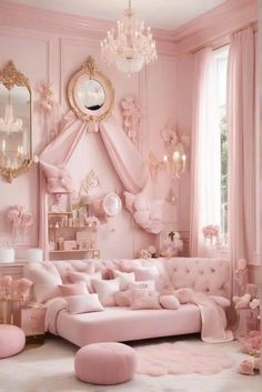 a living room with pink furniture and chandelier