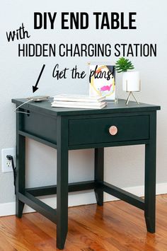 a black table with a sign on it that says diy end table with hidden charging station get the plans