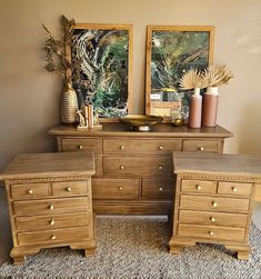 three wooden dressers sitting next to each other on top of a carpeted floor