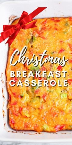 a casserole dish with the words christmas breakfast casserole on it and red ribbon