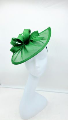 Green Wedding Fascinator. Beautiful headpiece for bridesmaids and a great accessory for a cocktail party or church outfit.  Comes with a pin or headband for an elegant but secure look. - Headband and hairclip  - Ready to ship  - Lightweight - Free Shipping - Fast shipping - Customize by adding different color flowers and or feathers Check my store for styles and colors.  Hatsandpearls.etsy.com Find more at my website: Www.hatsandpearls.com  Reach out to me if you can't find what you are looking for.  I can make cake custom orders and help you style and match your outfit  Tag and share your pictures when you wear and style our hats.  Instagram: @hats_pearls Facebook: Hats Pearls Thank you for visiting and happy shopping! Luxury Green Costume Hats And Headpieces For Women, Luxury Green Fascinator For Formal Occasions, Luxury Curved Brim Green Headpiece, Elegant Green Fascinator For Church, Elegant Green Headband For Party, Elegant Green Church Fascinator, Elegant Fitted Green Headband, Adjustable Fascinator For Church And Royal Ascot, Green Headband For Royal Ascot Wedding