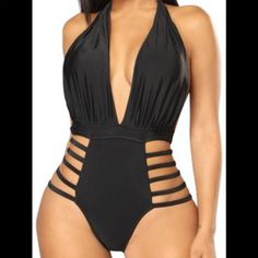 Yira Bandage Swimsuit You Can Also Wear This As A Bodysuit Brand New Size Xl With Tags Ask Questions Check Out My Other Items Open To Offers Strappy Beach Bodysuit With Lined Body, Black Strappy Lined Swimwear, Strappy Lined Bodysuit For The Beach, Black Halter Neck Bodysuit For Beach, Black Halter Neck Bodysuit For The Beach, Black Triangle Top Bodysuit For Vacation, Black Halter Neck Bodysuit For Pool, Black Strappy Beachwear Bodysuit, Black Strappy Bodysuit For Beachwear