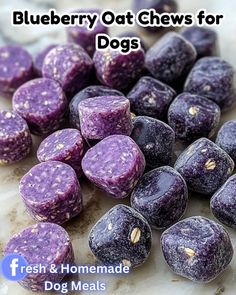 blueberry oat chews for dogs on a marble surface with the words fresh & homemade dog treats