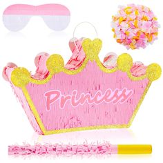 a pink princess crown with sunglasses and confetti