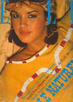 a magazine cover with a woman wearing a headdress