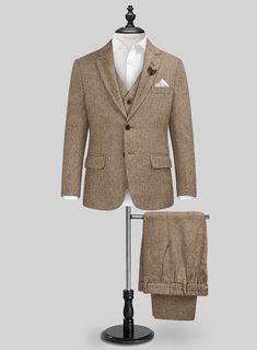 Our Irish Brown Herringbone Tweed Boys Suit is the ultimate blend of class and comfort, excelling on all levels of luxury. Crafted from the coziest wool, our suit boasts a fresh brown shade in a herringbone design, elevating your little man's style game without compromising comfort. Whether it's a family wedding, a fancy dinner, or just a day when he wants to feel extra special, this suit is his ticket to looking sharp - because every kid deserves to feel like a fashion icon.   Look Includes  Ir Italian Suit, Herringbone Design, Herringbone Tweed, Linen Suits, Tweed Suits, Fancy Dinner, Boys Suits, Tweed Fabric, Double Breasted Suit