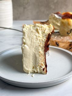 a piece of cake sitting on top of a white plate