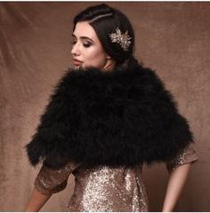 a woman wearing a black fur stole and gold sequins on her head, standing in front of a brown backdrop