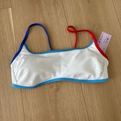 Size Small Red, White, And Blue Target Bikini Top. Brand New! Sporty White Swimwear For Sunbathing, White Color Block Swimwear For Sunbathing, Summer Stretch Swimwear By Target, Target Stretch Swimwear For Beach Season, White Color Block Swimwear For Spring, Target Stretch Swimwear For Summer, White Color Block Swimwear For Beach, Casual White Color Block Swimwear, White Color Block Swimwear For Summer