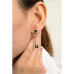 This is part of Chairish’s Fine Jewelry assortment.  Natural Emerald Diamond Dangle Earrings in 18K Gold to make a statement with your look. These earrings create a sparkling, luxurious look featuring octagon cut emerald. Emerald enhances intellectual capacity of the person.  Designed with octagon cut emerald set in bezel set as stud, with diamond and emerald long charm attached back of the stud making a drop earrings. This earrings can be worn in two  ways either with the charm as long earrings Elegant Gemstone Linear Earrings For Formal Events, Elegant Gemstone Linear Earrings For Formal Occasions, Formal Dangle Gemstone Linear Earrings, Formal Gemstone Dangle Linear Earrings, Timeless Green Earrings For Formal Occasions, Timeless Green Earrings For Formal Events, Elegant Green Drop Linear Earrings, Elegant Green Linear Earrings As Gift, Elegant Green Dangle Linear Earrings