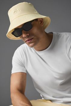 Top off your fave Alo look with the Fundamental Bucket Hat. Anything but basic, this true icon is now designed in an of-the-moment waxed canvas with a shiny finish. The interior sweatband has an adjustable elastic and stopper. It’s sure to become your go-to today and every day. Lemon Ice, Waxed Canvas, Alo Yoga, Bucket Hat, Every Day, Lemon, Elastic, Hats, Canvas