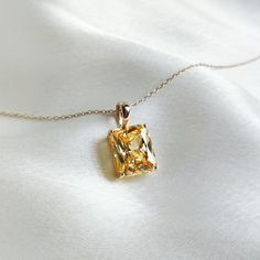 This stunning pendant is set in 14K Solid Yellow Gold with Cubic Zirconia in classic prong setting. It is an unique gemstone pendant for nearly every occasion and is completely hassle-free jewelry. ◾ITEM DETAILS * Gem: Cubic Zirconia * Gem Size: 10X12mm * Gem Shape: Octagon cut * Gem Weight: 10.15 carats * Gold Purity: 14KT  * Gold Weight: 0.98gram * Total Weight of the Pendant: 3.01 gram The Gold purity is guaranteed and it comes with authentic 14KT gold hallmark. Since my items are handmade, t Luxury Kunzite Yellow Gold Jewelry, Luxury Gold Necklace With Radiant Cut, Gold Cubic Zirconia Necklace With Radiant Cut, Gold Radiant Cut Cubic Zirconia Necklaces, Gold Radiant Cut Cubic Zirconia Necklace, Gold Radiant Cut Necklace Fine Jewelry, Elegant Radiant Cut Yellow Gold Necklace, Classic Citrine Pendant Jewelry, Yellow Gold Necklace With Radiant Cut Prong Setting