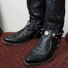 * Customize your look with adjustable Buffalo Nickel Boot Straps in black leather * Authentic buffalo nickel * Chain with clasp keeps strap from turning * Price is per individual strap Masc Fashion, Mens Motorcycle Boots, Boot Chains, Custom Boots, Buffalo Nickel, Boots Cowboy, Boot Straps, Harness Boots, Cowboy Style