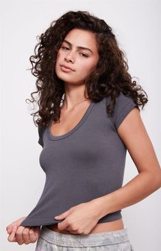 The Seamless Scoop Top from PS Basics by Pacsun offers a comfortable and flattering fit for your everyday style. This top has short sleeves, a scoop neckline, and a fitted design.Solid color topSeamless fabricGood stretchShort sleevesScoop necklineFitted67% rayon, 25% nylon, 8% spandexHand washModel is wearing a size XS PS Basics by Pacsun Womens Seamless Scoop Top - Gray size Medium Seamless Scoop Neck T-shirt For Spring, Scoop Neck Seamless T-shirt For Spring, Seamless Scoop Neck T-shirt For Summer, Everyday T-shirt With Scoop Neck, Scoop Neck Top With Seamless Construction, Summer Seamless Scoop Back Top, Summer Scoop Back Seamless Top, Basic Scoop Neck Tops For Everyday, Solid Color Scoop Neck Short Sleeve Top For Summer