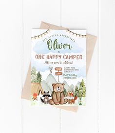 a card with an image of a bear and other animals in the woods on it