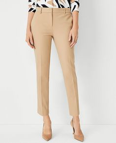 Elevate your wardrobe with the Ann Taylor Eva Ankle Pant in a sophisticated Cappuccino Tan. Designed specifically for a curvy fit, these pants offer a flattering silhouette with a fuller hip and thigh area, ensuring comfort without sacrificing style. 

- Size: 0
- Fit: Curvy
- Length: Ankle-length with a 27" inseam and 14 1/2" leg opening
- Rise: Mid-rise, sits 2 1/4" below the natural waist
- Material: 92% Cotton, 8% Spandex
- Color: Cappuccino Tan
- Gender: Female
- Garment Care: Machine washa Slacks Women, Lean Legs, Slacks For Women, Chic Pants, Knitted Suit, Tan Woman, Tall Pants, Petite Outfits, Slim Leg