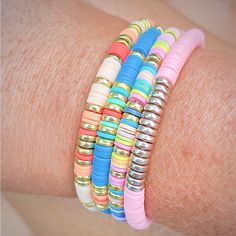 Fun Colorful Bracelet Stack Pink Heishi Beads Bracelets For Vacation, Pink Heishi Beads Vacation Bracelets, Spring Pink Beaded Bracelets With Colorful Beads, Pink Friendship Bracelets With Colorful Beads For Spring, Playful Pink Bracelets With Tiny Beads, Pink Tiny Beads Bracelets For Spring, Clay Bead Bracelets, Colored Clay, Colorful Bracelet