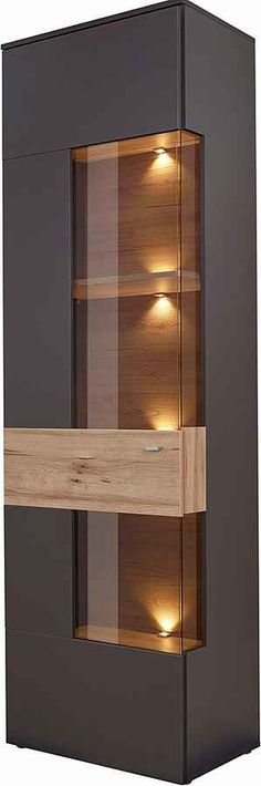 an illuminated display cabinet with two shelves on each side