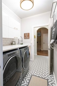 a washer and dryer in a small room