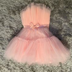 Never Worn, Excellent Condition, Comes In Original Plastic Summer Princess Dress For Party, Summer Mini Tutu Dress With Tulle Skirt, Summer Tulle Tutu Dress In Mini Length, Spring Sleeveless Princess Bridesmaid Dress, Spring Evening Princess Dress In Tulle, Spring Evening Tulle Princess Dress, Sleeveless Tutu Dress For Summer, Strapless Tulle Mini Dress For Spring, Spring Mini Tutu Dress With Tulle Skirt