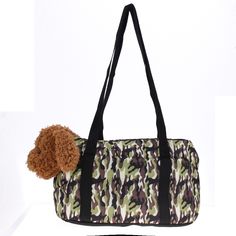 a duffel bag with a stuffed animal on top and two other items in front