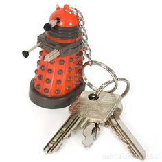 a red and black dalen keychain with two keys